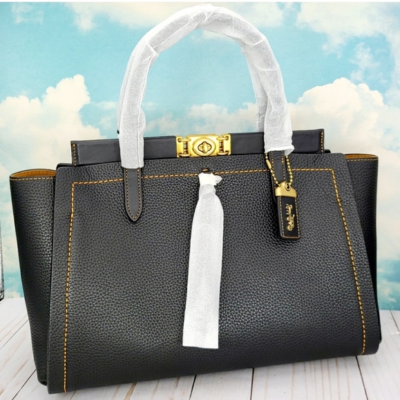 coach troupe carryall 35